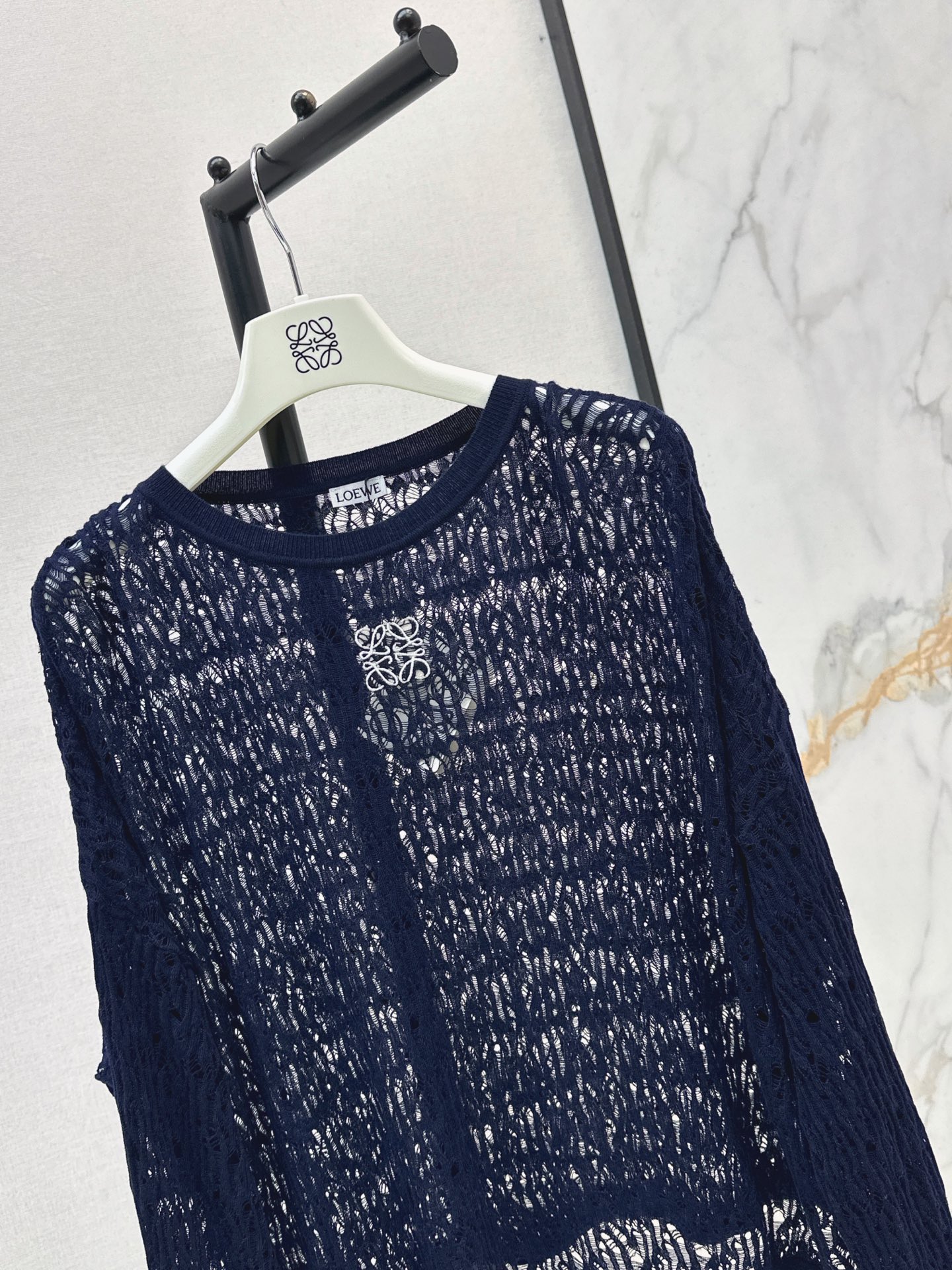 Loe 26fw hollow knit top