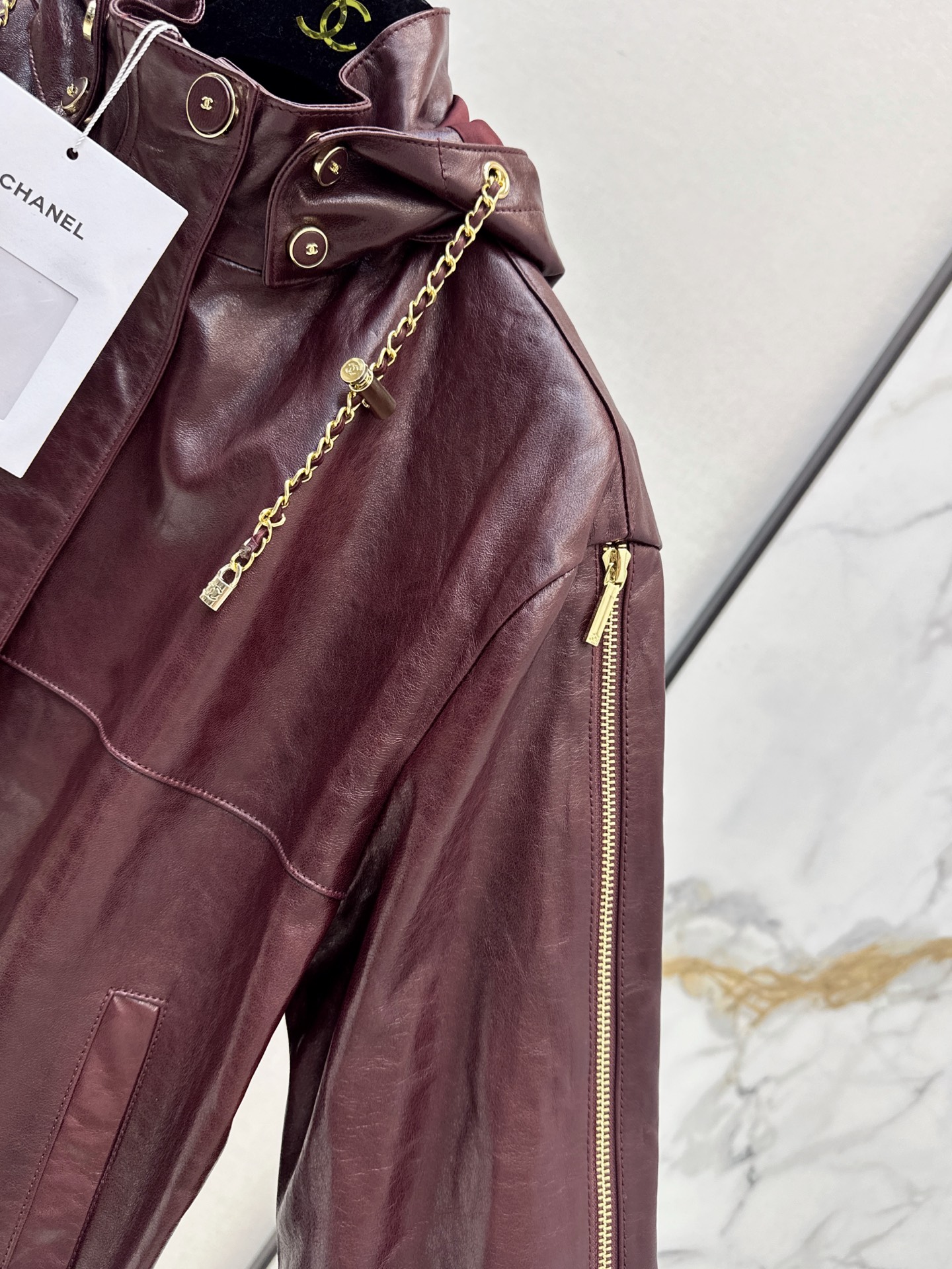 Chan 26ss leather hooded jacket