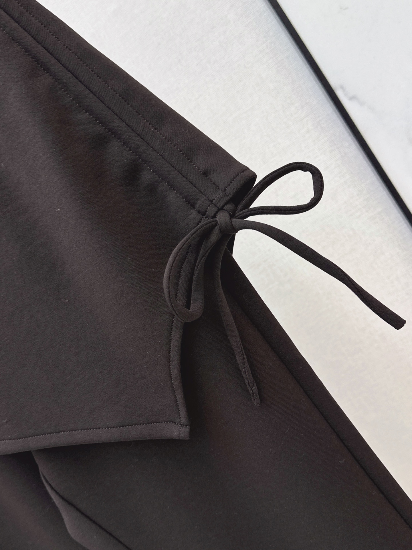 Sain 26fw asymmetric skirt-overlay flared pants