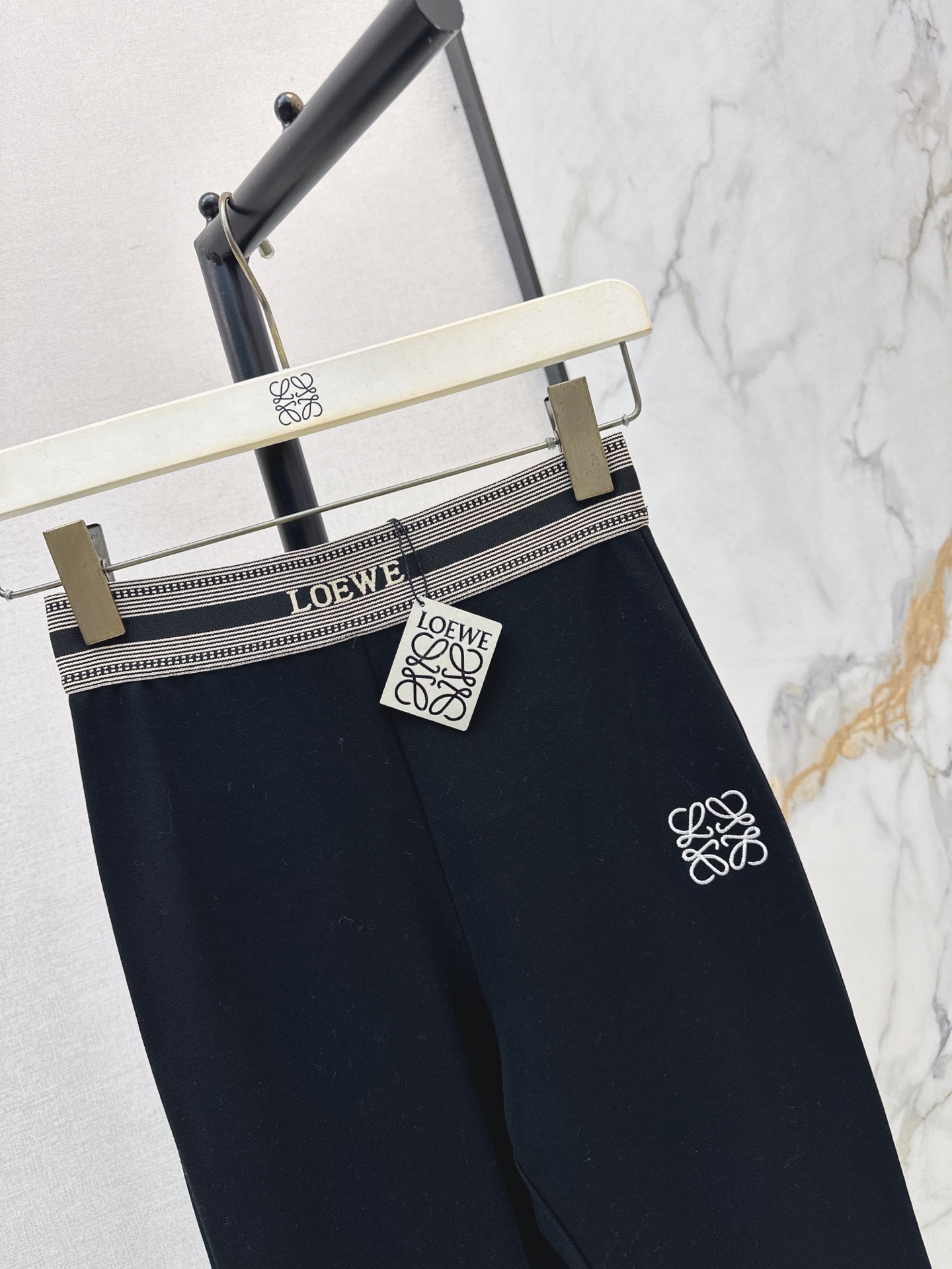 Loe 26fw contrast-stripe waistband flared Pants