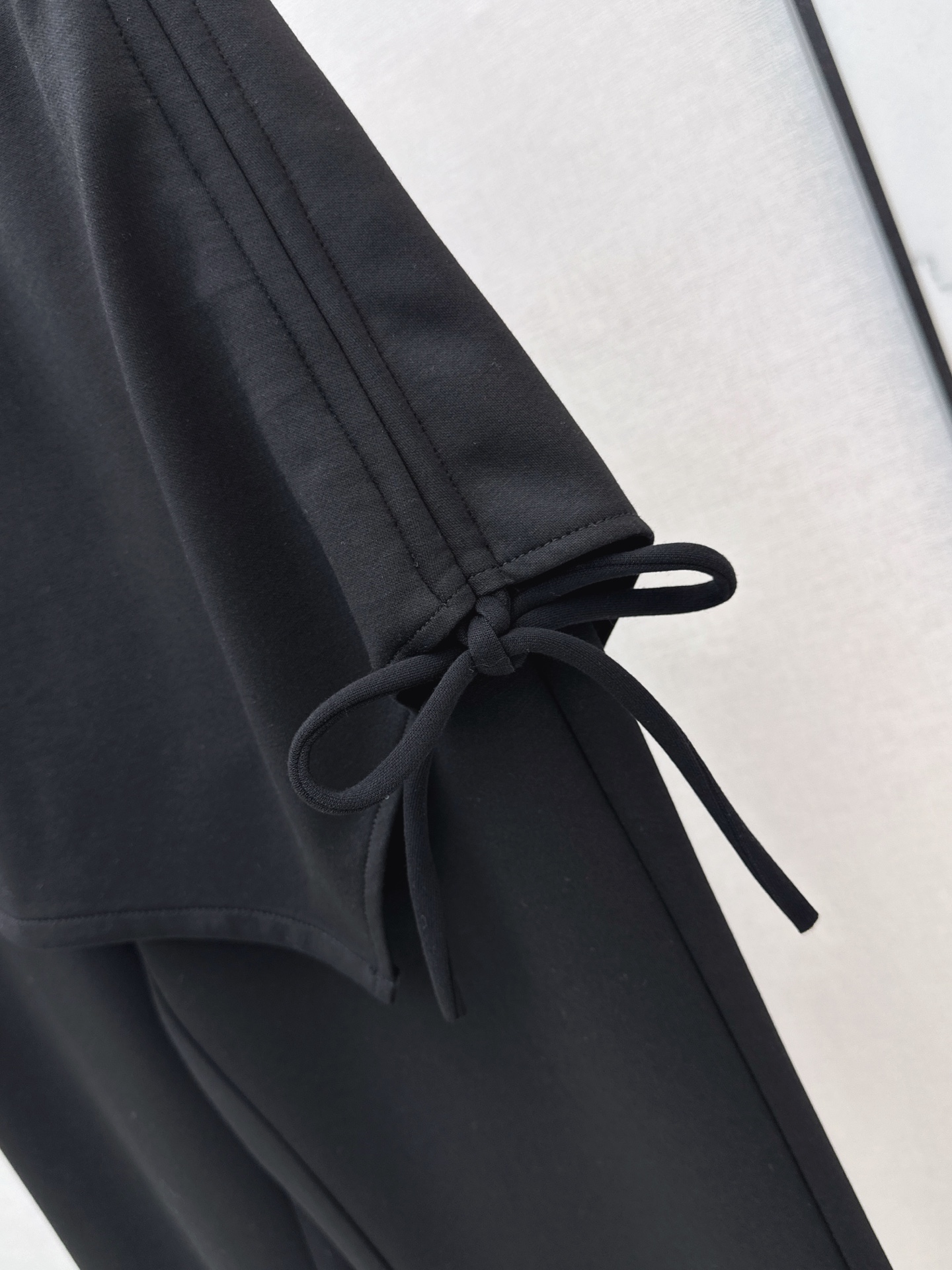 Sain 26fw asymmetric skirt-overlay flared pants