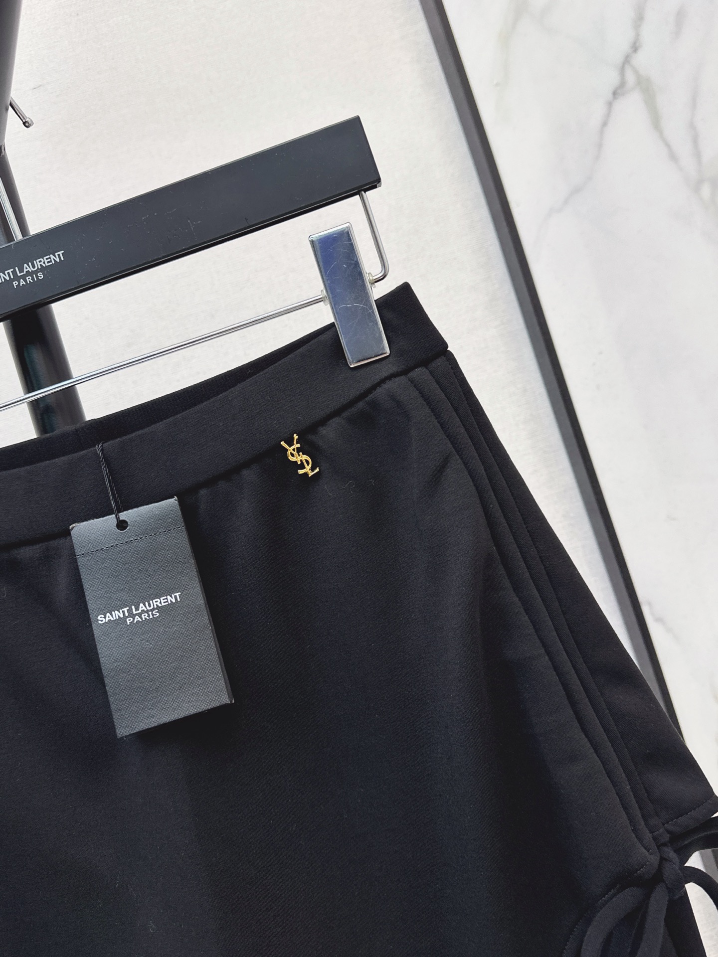 Sain 26fw asymmetric skirt-overlay flared pants