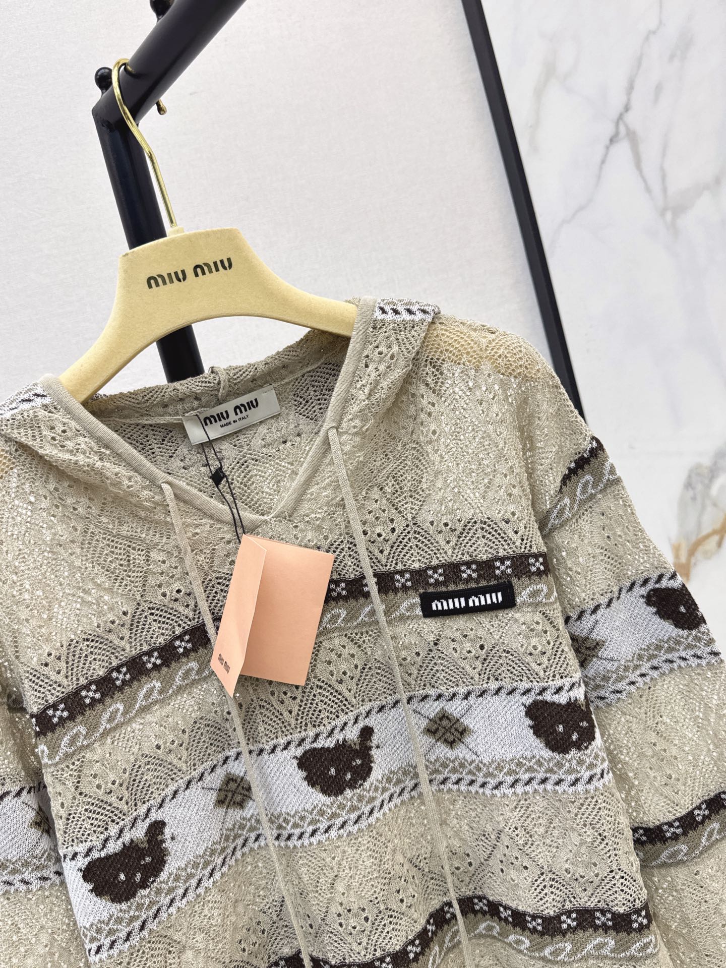 Miu 26fw jacquard hooded knit sweater