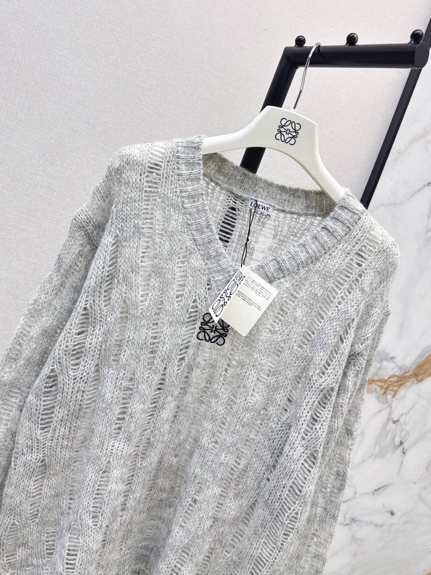 Loe 26fw hollow knit sweater