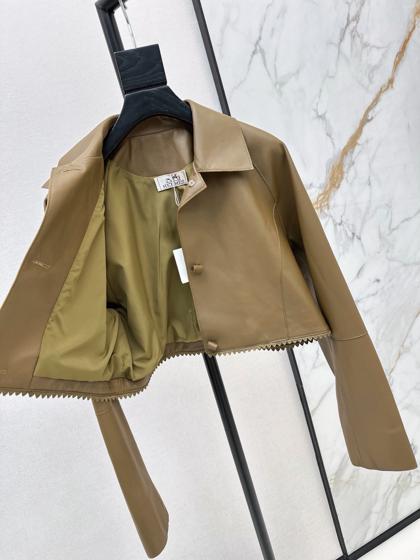 Her 26ss cropped leather jacket
