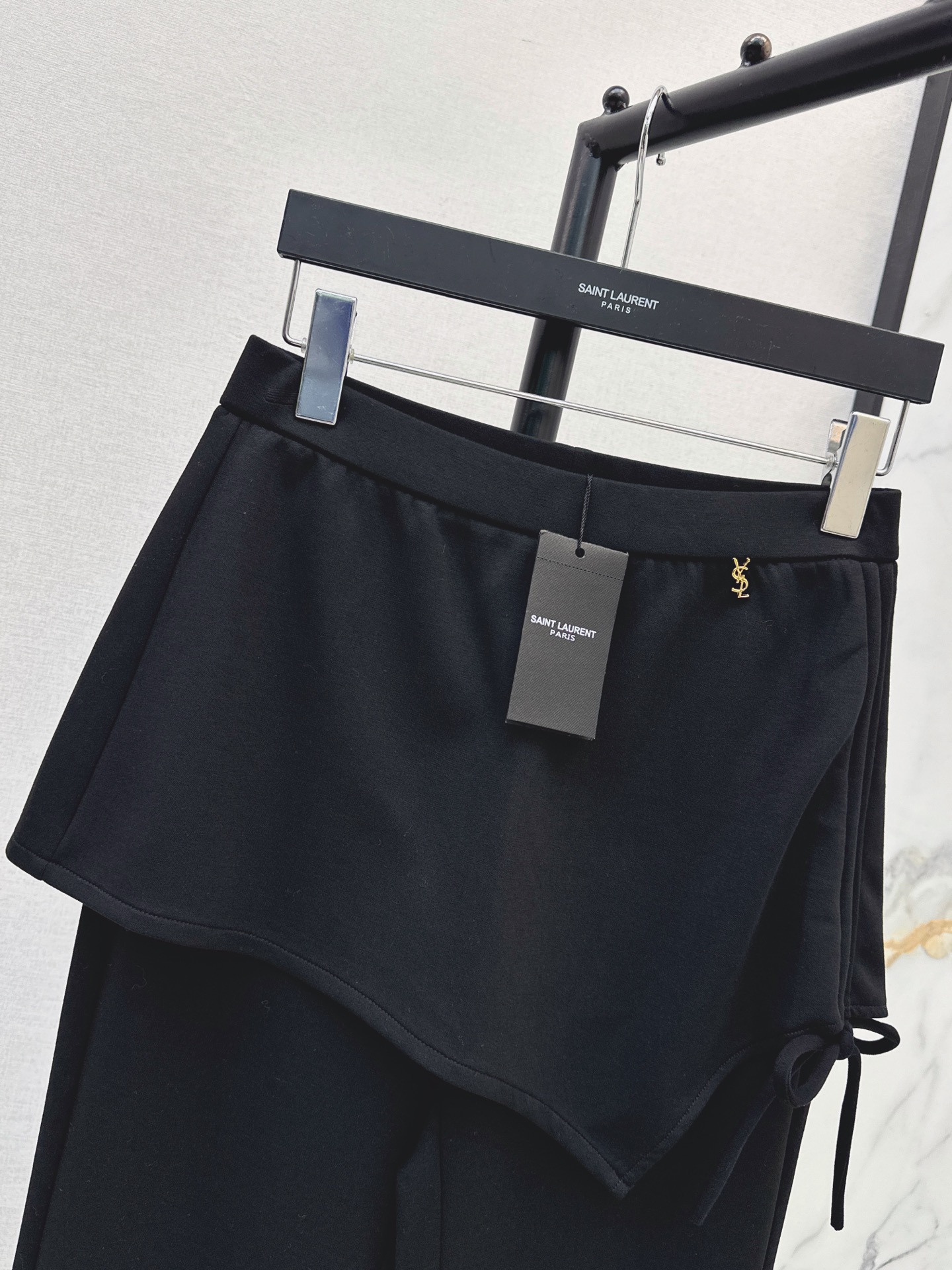 Sain 26fw asymmetric skirt-overlay flared pants