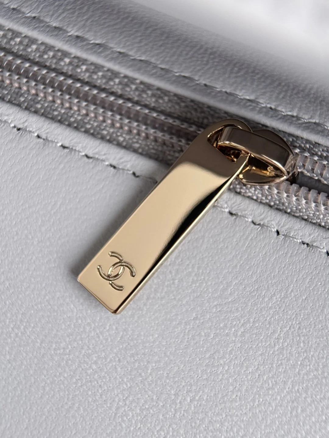 Chan 25P mini flap bag with top handle