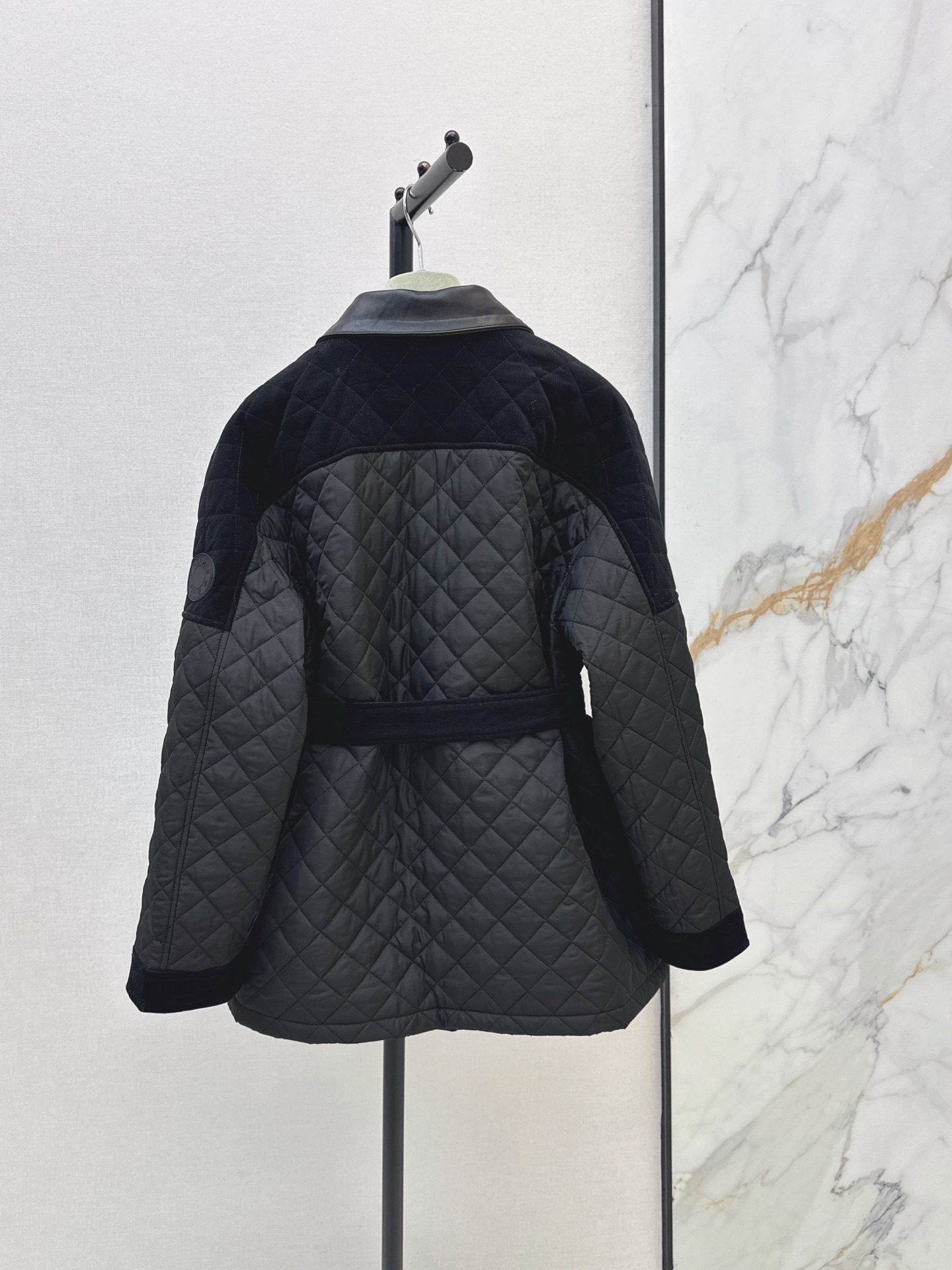Her 26fw belted padded jacket