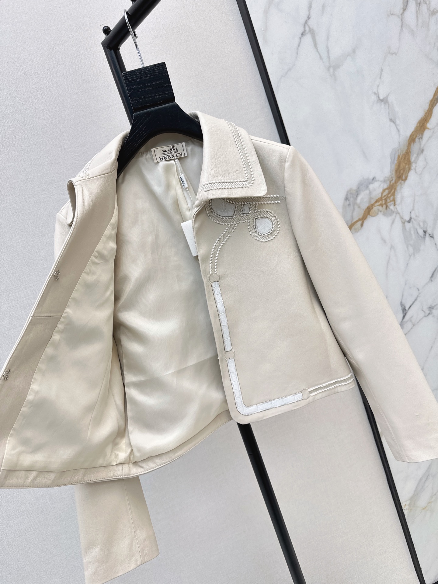 Her 26fw embroidery cropped leather jacket