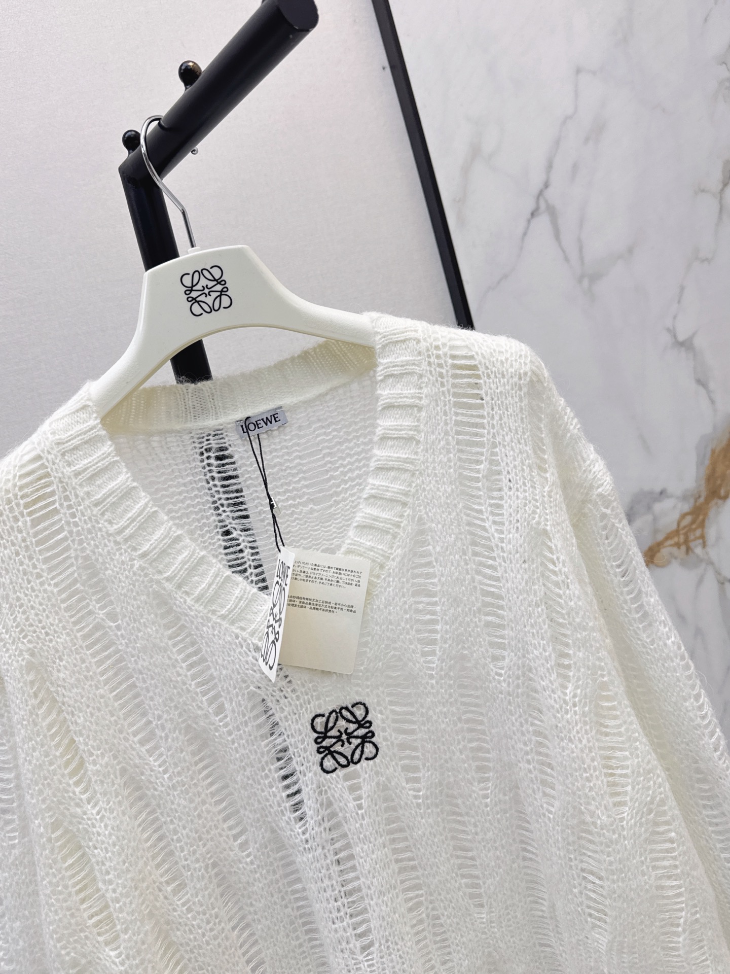 Loe 26fw hollow knit sweater