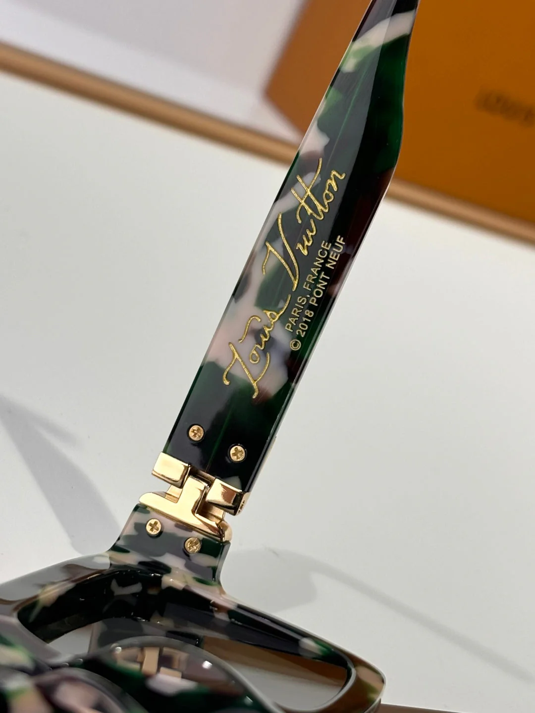 L milionair sunglasses